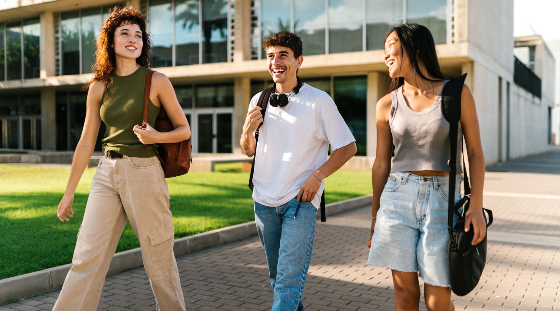 people walking through a campus