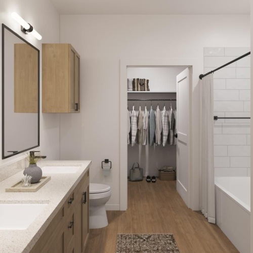 a bathroom with a tub sink and toilet